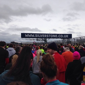 The runners at the start along the old start finish straight at Silverstone